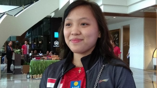 Pebulutangkis spesialis ganda campuran Indonesia, Winny Oktavina Kandow, usai mengikuti pelepasan Tim Indonesia di Piala Sudirman 2019 di Hotel Century, Senayan, Jakarta, Sabtu (11/5/2019). [Suara.com/Arief Apriadi]