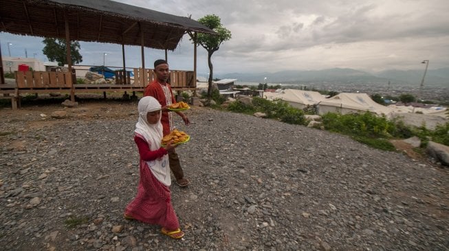 Suasana di Musala Kamp Pengungsi Balaroa, Palu, Sulawesi Tengah, Selasa (14/5). [ANTARA FOTO/Basri Marzuki]