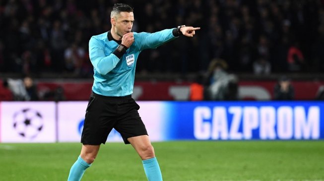 Wasit UEFA, Damir Skomina bakal memimpin fina Liga Champions. (ANNE-CHRISTINE POUJOULAT / AFP)