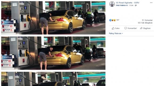 Pria ganti plat nomor mobil di SPBU. (Facebook/SG Road Vigilante)