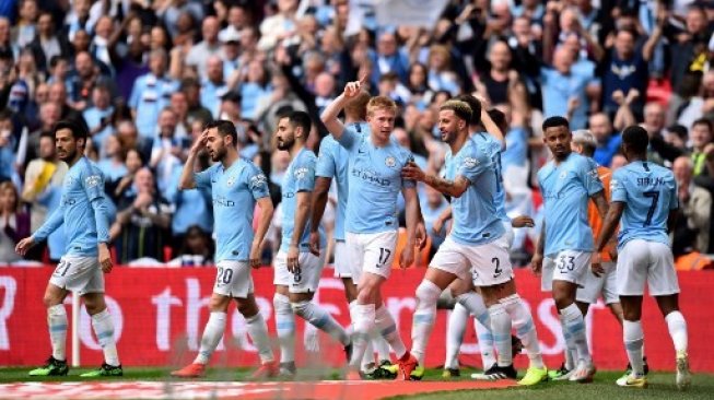 Pemain Manchester City rayakan kemenangan di final Piala FA kontra Watford yang berlangsung di Wembley, Sabtu (19/5/2019) [AFP]