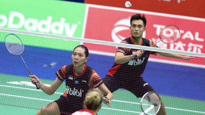 Pasangan ganda campuran Hafiz Faizal/Gloria Emanuelle Widjaja gagal sumbang poin untuk Tim Indonesia di laga penyisihan Grup 1B Sudirman Cup 2019. Hafiz/Gloria yang turun di partai pertama takluk dari pasangan Mathias Christiansen/Sara Thygesen (Denmark), Rabu (22/5/2019). [Humas PBSI]