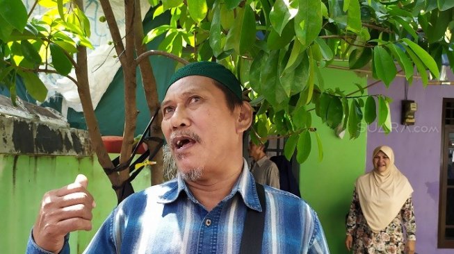 Safri, ayah Farhan yang tewas diduga tertembak aparat keamanan 22 Mei. (Suara.com/Supriyadi).