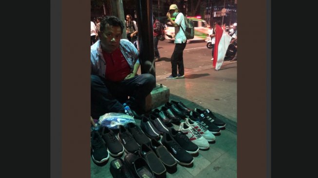 Cuit Wartawan Asing Ditawari Sepatu Rp 100 Ribu saat Kerusuhan 22 Mei