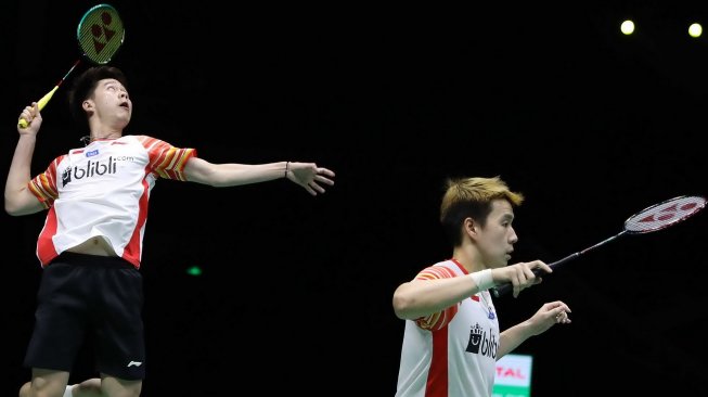 Pasangan ganda putra Kevin Sanjaya Sukamuljo/Marcus Fernaldi Gideon menyumbang angka bagi Indonesia vs Jepang usai mengalahkan Takeshi Kamura/Keigo Sonoda di babak semifinal Piala Sudirman 2019, Sabtu (25/5). [Humas PBSI]