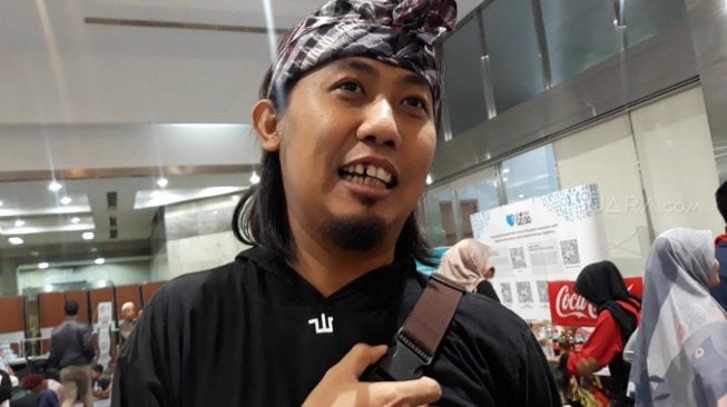 Ade Jigo di JCC Senayan, Jakarta Pusat, Minggu (26/5/2019). [Suci Febriastuti/Suara.com]