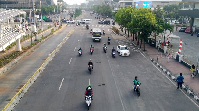 Suasana di Jalan MH Thamrin, Jakarta, Selasa (28/5). [Suara.com/Oke Atmaja]