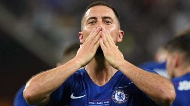 Gelandang Chelsea Eden Hazard merayakan selebrasinya setelah mencetak gol ke gawang Arsenal di final Liga Europa. OZAN KOSE / AFP