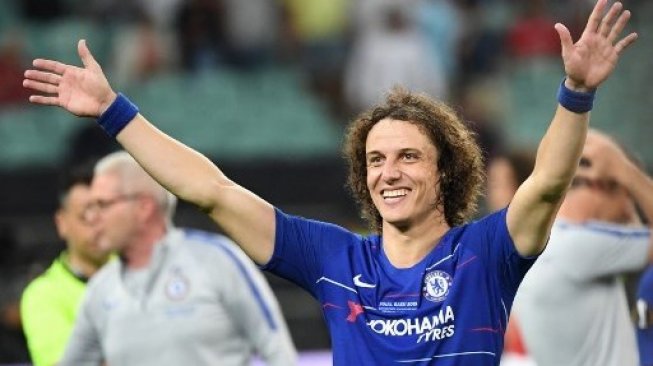 Bek Chelsea asal Brasil David Luiz merayakan kemenangan timnya atas Arsenal di final Liga Champions. Kirill KUDRYAVTSEV / AFP
