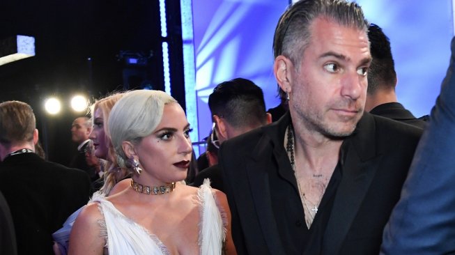 Lady Gaga dan Christian Carino [Valerie Macon / AFP]