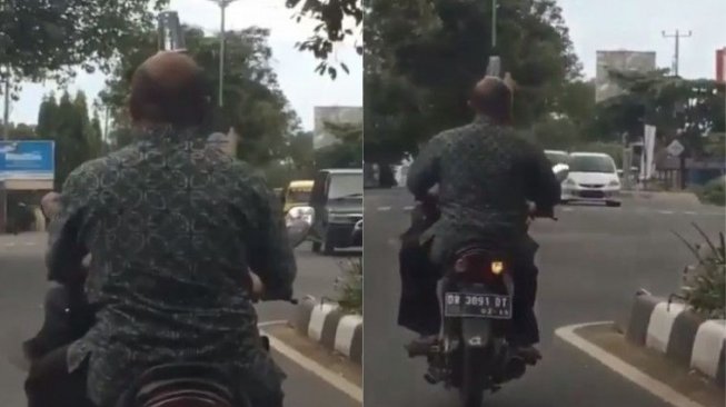 Mirip Atraksi Sirkus, Bapak-Bapak Ini Pamer Kebolehan di Jalan Raya