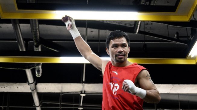 Legenda tinju dunia, Manny Pacquiao, menjalani latihan di sebuah gym di Manila, Filipina, jelang pertarungan melawan Keith Thurman, Kamis (6/6/2019). [AFP/Noel Celis]