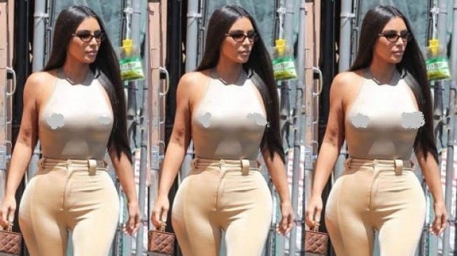 Kim Kardashian seksi mengenakan baju tanpa bra. [Instagram @womanslook]