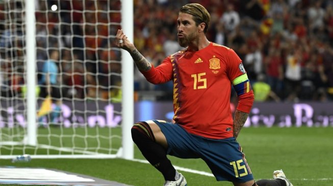 Ekspresi Sergio Ramos usai mencetak gol ke gawang Swedia di penyisihan Grup F Kualifikasi Piala Eropa 2020, Selasa (11/6/2019). [PIERRE-PHILIPPE MARCOU / AFP]