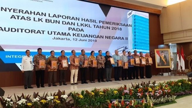 Acara penyerahan laporan audit keuangan negara di BPK. (Suara.com/Achmad Fauzi)