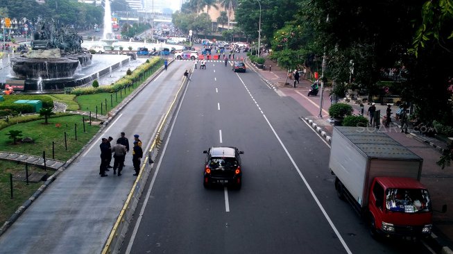 Suasana di Jalan Merdeka Barat, Jakarta, Jumat (14/6). [Suara.com/Oke Atmaja]