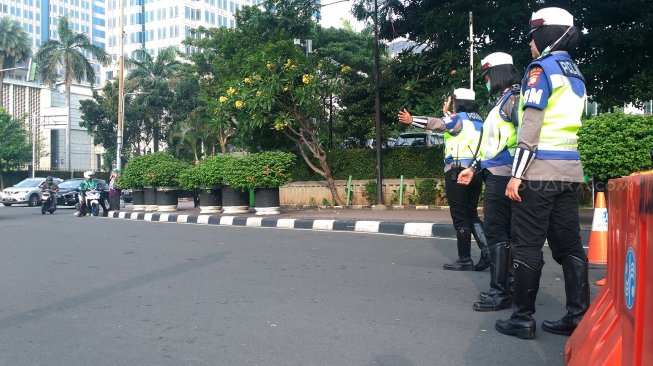 Suasana di Jalan Merdeka Barat, Jakarta, Jumat (14/6). [Suara.com/Oke Atmaja]