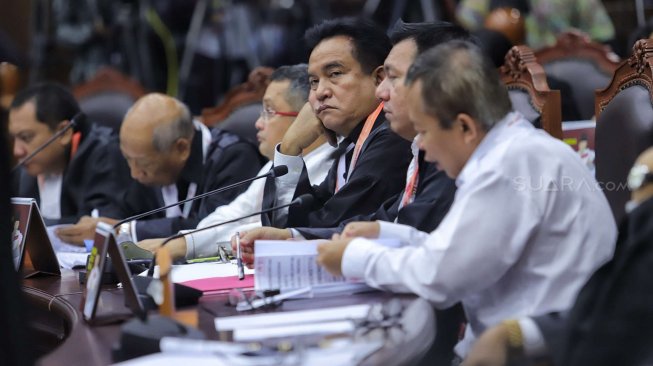 Suasana sidang perdana Perselisihan Hasil Pemilihan Umum (PHPU) sengketa Pilpres 2019 di Mahkamah Konstitusi, Jakarta, Jumat (14/6). [Suara.com/Muhaimin A Untung]