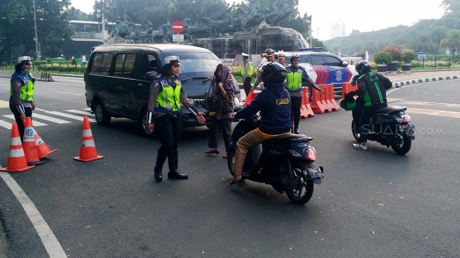 Suasana di Jalan Merdeka Barat, Jakarta, Jumat (14/6). [Suara.com/Oke Atmaja]