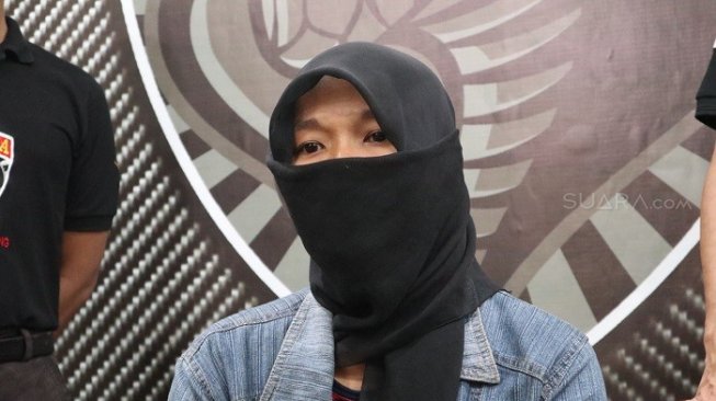 Lasmini, istri yang digadaikan Hori ke orang lain seharga Rp 250 juta. (Suara.com/Achmad Ali)