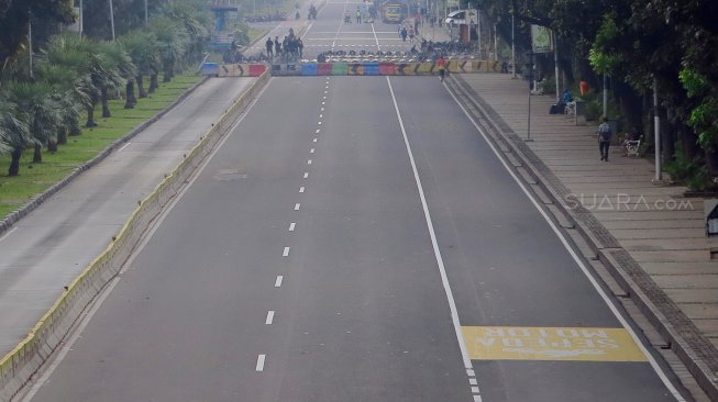 Suasana di Jalan Merdeka Barat, Jakarta, Jumat (14/6). [Suara.com/Oke Atmaja]