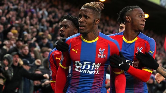 Winger andalan Crystal Palace, Wilfried Zaha. [Daniel LEAL-OLIVAS / AFP]