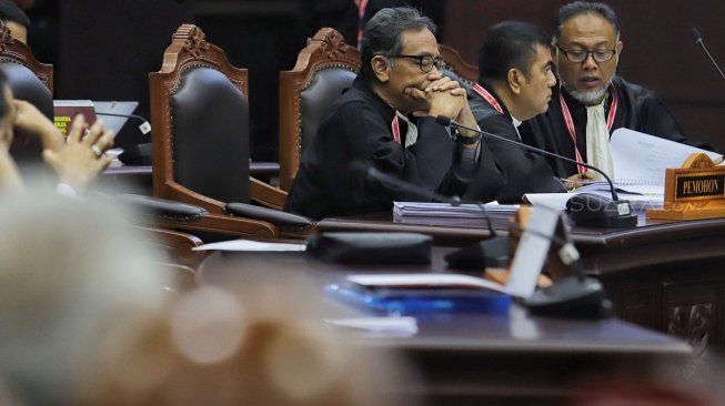 Suasana sidang lanjutan Perselisihan Hasil Pemilihan Umum (PHPU) sengketa Pilpres 2019 di Mahkamah Konstitusi, Jakarta, Selasa (18/6). [Suara.com/Muhaimin A Untung]