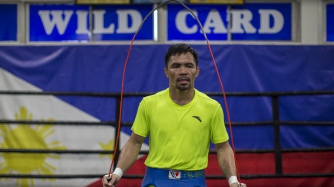 Petinju Filipina, Manny Pacquiao, berlatih skipping di sasana Wild Card Boxing, Los Angeles, AS, Kamis (20/6/2019). [AFP/Apu Gomes]