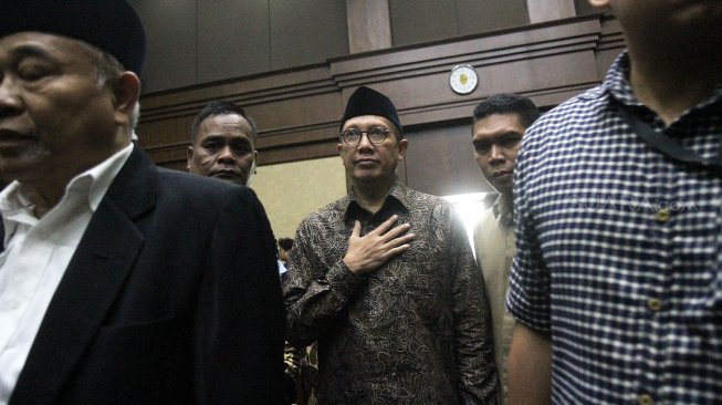 Menteri Agama Lukman Hakim Saifuddin saat tiba di Pengadilan Tindak Pidana Korupsi (Tipikor), Jakarta, Rabu (26/6). [Suara.com/Arief Hermawan P]