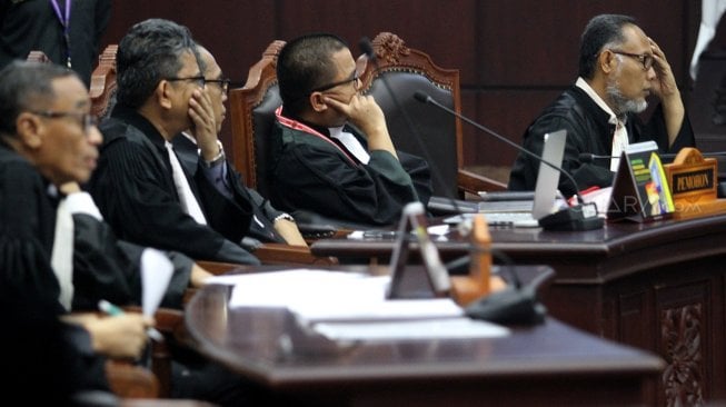 Suasana sidang putusan Perselisihan Hasil Pemilihan Umum (PHPU) di gedung Mahkamah Konstitusi, Jakarta, Kamis (27/6). [Suara.com/Arief Hermawan P]