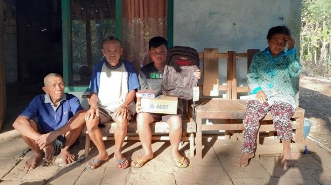 Pasha Pratama (12), warga Bulu RT5/RW14 Desa Bejiharjo, Karangmojo, Kabupaten Gunungkidul, Daerah Istimewa Yogyakarta. [Suara.com/Rahmat Ali]