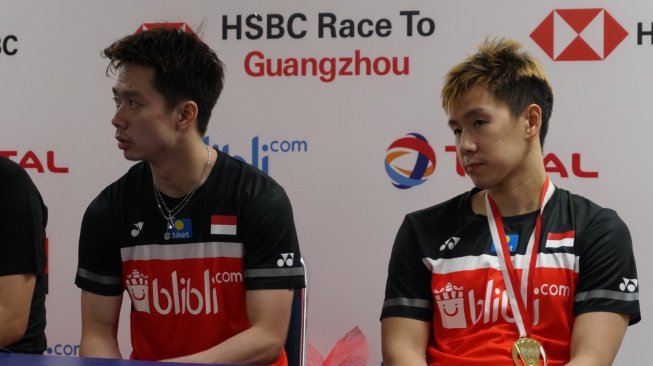 Pasangan ganda putra Indonesia, Kevin Sanjaya Sukamuljo/Marcus Fernaldi Gideon di Istora Senayan, Jakarta, Minggu (21/7/2019). (Suara.com / Arief Apriadi) 