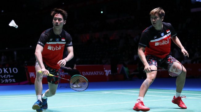 Pasangan ganda putra Indonesia, Kevin Sanjaya Sukamuljo/Marcus Fernaldi Gideon, memenangi babak pertama Japan Open 2019 usai mengalahkan He Ji Ting/Tan Qiang (China), Rabu (24/7). [Humas PBSI]