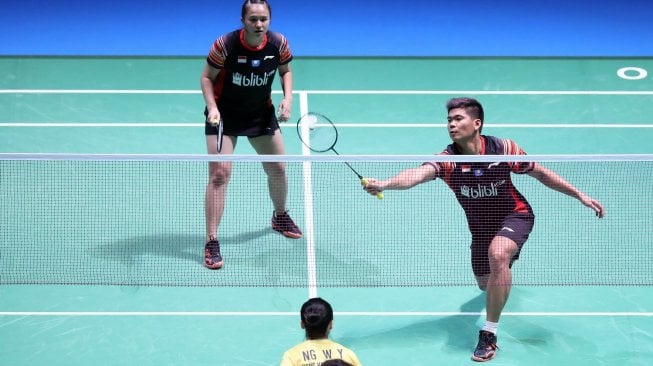 Pasangan ganda campuran Indonesia, Praveen Jordan/Melati Daeva Oktavianti, memenangi babak kedua Japan Open 2019 dengan mengalahkan Chang Tak Ching/Ng Wing Yung (Hong Kong) di Musashino Forest Sport Plaza, Tokyo, Kamis (25/7). [Humas PBSI]