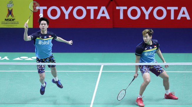 Pasangan ganda putra Indonesia, Kevin Sanjaya Sukamuljo/Marcus Fernaldi Gideon, menang atas pasangan China, Zhang Nan/Ou Xuan Yi, di babak kedua Thailand Open 2019, Kamis (1/8). [Humas PBSI]