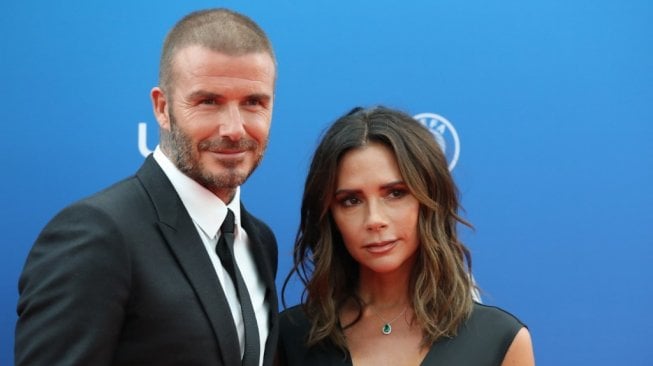 David Beckham, bersama sang istri Victoria Beckham [AFP/Valery Hache]