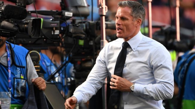 Legenda Liverpool yang juga menjadi komentator Sky Sports, Jamie Carragher. (Paul ELLIS / AFP)