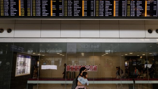 Suasana di Bandara Internasional Hong Kong, Cina, Selasa (13/8). [Philip FONG / AFP]
