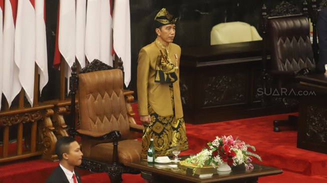 Presiden Joko Widodo saat menghadiri  sidang bersama DPD-DPR di Kompleks Parlemen, Jakarta, Jumat (16/8). [Suara.com/Arya Manggala]
