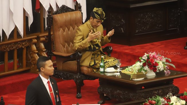 Presiden Joko Widodo saat menghadiri  sidang bersama DPD-DPR di Kompleks Parlemen, Jakarta, Jumat (16/8). [Suara.com/Arya Manggala]
