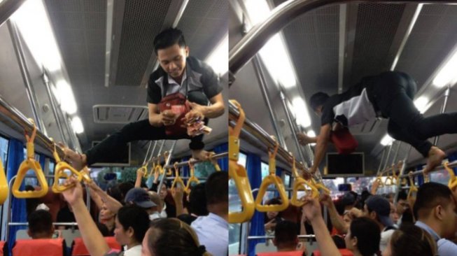 Bus Terlalu Penuh, Aksi Kondektur Bus Panjat Tiang Ini Mirip Spiderman