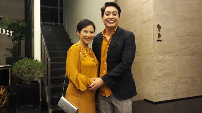 Edric Tjandra dan istri, Venny Tjandra [Ismail/Suara.com]