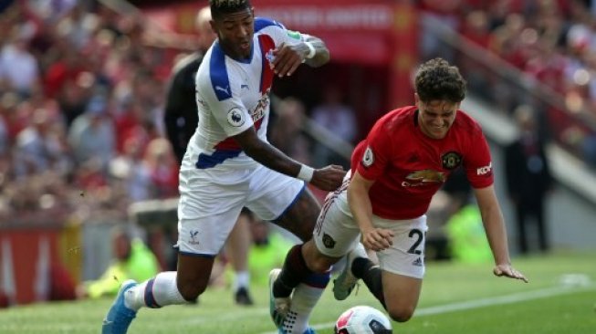 Aksi winger Manchester United, Daniel James, saat pertandingan melawan Crystal Palace pada pekan ketiga Liga Primer Inggris di Old Trafford, Sabtu (24/8/2019) malam WIB. (LINDSEY PARNABY / AFP)