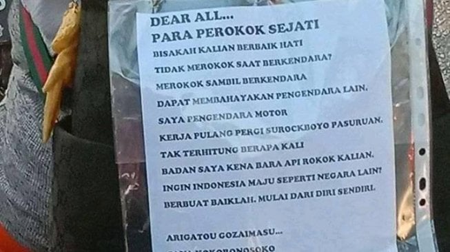 Pesan dari pemotor yang ditujukan untuk perokok di jalan.(Facebook/Christ Pratama Handika)