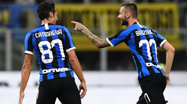 Gelandang Inter Milan, Marcelo Brozovic (kanan). [Miguel MEDINA / AFP]