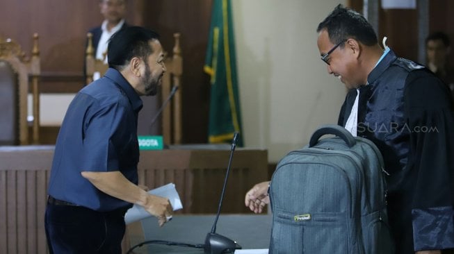 Terpidana kasus e-KTP Setya Novanto saat menghadiri sidang pengajuan peninjauan kembali (PK) di Pengadilan Negeri Jakarta Pusat, Rabu (28/8).[Suara.com/Arya Manggala]