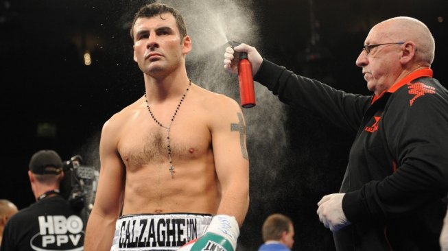 Legenda tinju Wales, Joe Calzaghe (kiri). [AFP/Don Emmert]