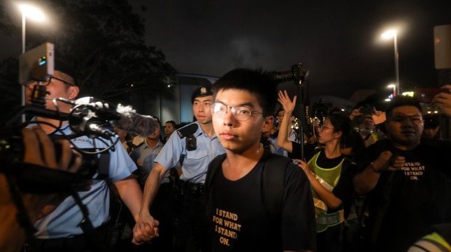 Joshua Wong saat ikut dalam aksi protes di Hong Kong. (AFP)