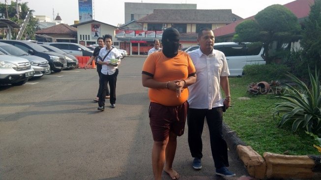 Adi, tersangka kasus pencabulan siswi SMP di Tangerang, Banten. (Suara.com/M. Iqbal).