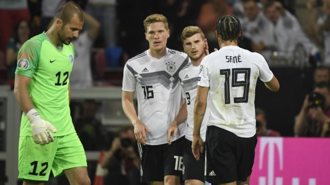 Penyerang Timnas Jerman, Timo Werner (kedua dari kanan). [INA FASSBENDER / AFP]